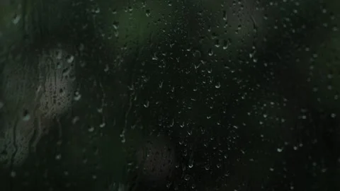 Slow-motion clip of raindrops on a window. Stock Footage 155449676