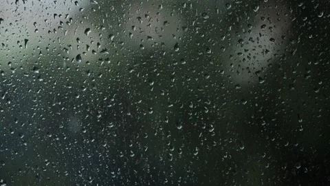 Slow-motion clip of raindrops on a window. Stock Footage 155450123