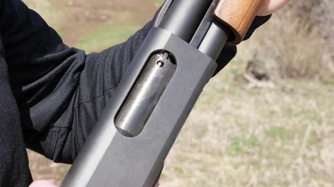 Slow-Motion Clip Of Shotgun Pump-Action To Unload Shell Stock-Footage 77312460