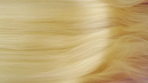Slow motion of close-up of beautiful blond long smooth straight hair texture Stock Footage 133773896