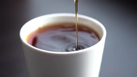 Slow Motion Close-up Black Tea Brewing in a White Mug Stock Footage 167886951