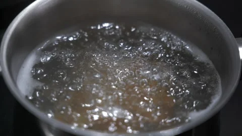 Slow motion close up boiling pasta water. Stock Footage 339805920