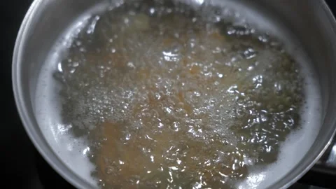 Slow motion close up boiling pasta water. Stock Footage 339805947