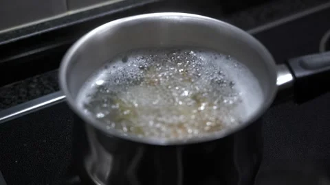 Slow motion close up boiling pasta water Stock Footage 339805966