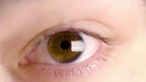 Slow motion close up of a brown eye Stock Footage 137460094