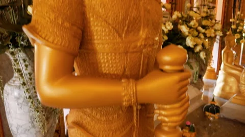 Slow motion close up Buddhist temple entrance guardian statue Video stock 56485175