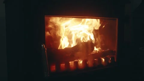 Slow Motion Close-Up of Burning Firewood Flames in a Fireplace Stove Stock Footage 342376939