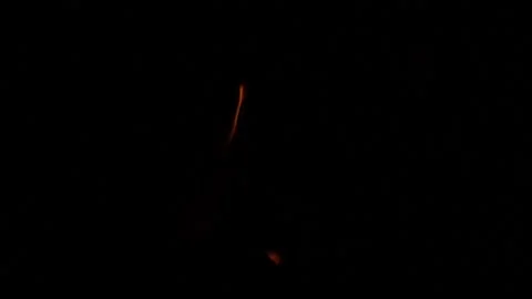 Slow motion close-up of a campfire flame dancing in the dark Stock Footage 161531429