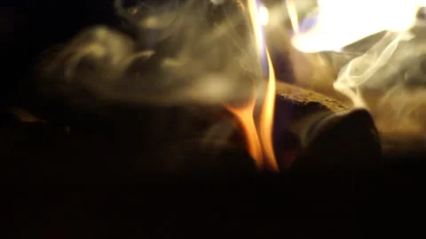 Slow motion close-up of a campfire flame dancing in the dark Stock Footage 161531477
