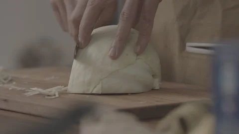 Slow Motion Close-Up of Chef Slicing Fresh Cabbage on Wooden Cutting Board Stock-Footage 321423816