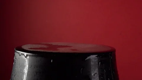Slow Motion Close-Up Cola Pour Into Glass On A Red Background Stock Footage 122694934