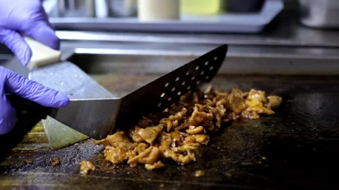 Slow-Motion Close-Up of Cook Stirring Minced Meat in Sauce and Spices Stock Footage 288576711