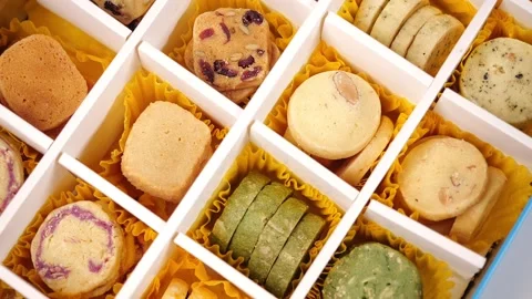 Slow motion close up Cookies biscuits turning Stock Footage 169072163