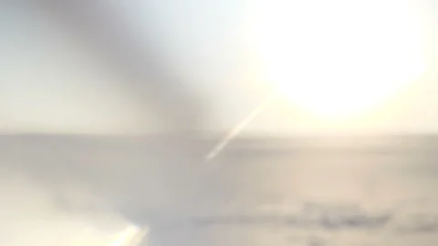 SLOW MOTION, CLOSE UP, COPY SPACE: Summer breeze sweeps away white sand out of Stockbeeldmateriaal 102883593