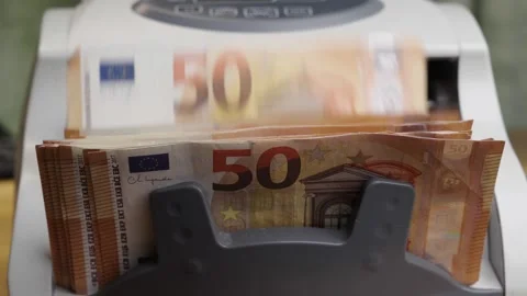 Slow motion close up of counting machine processing 50 Euro banknotes Stock Footage 336206646