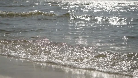 Slow motion close up of disturbed blue ocean water surface. Nice looping Stock Footage 128419177