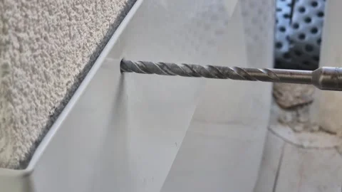 Slow motion close up of drilling metal flashing plate Stock-Footage 334993920