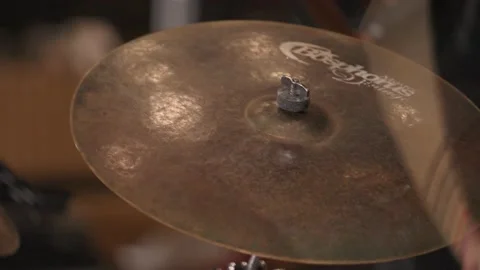 Slow motion close up of drumsticks hitting cymbal Stock Footage 204765416