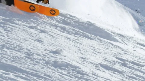 Slow motion close up of extreme freeride skiing in Swiss Alps Stock Footage 129084838