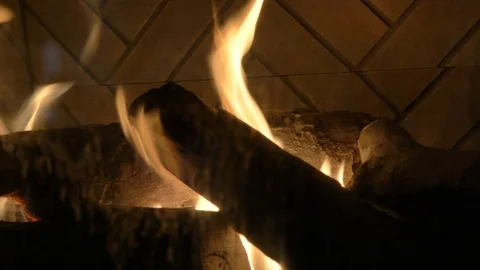 Slow motion close up fire in fireplace left to right Stock Footage 120303588