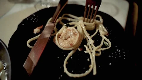 Slow Motion Close up Fork turning pasta shrimp on plate NYC 4k Stock Footage 255755586