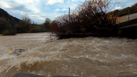 Slow motion close up forward moving behind concrete wall Stock Footage 120391413