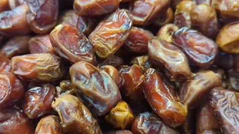 Slow Motion Close Up of Fresh Dried Dates Fruit Pile Stock Footage 328800648
