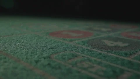 Slow motion close-up gaming table on numbers 1 and 4 Stock Footage 335700147