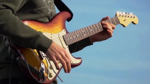 Slow motion. Close-up of guitar playing. Video stock 106291549