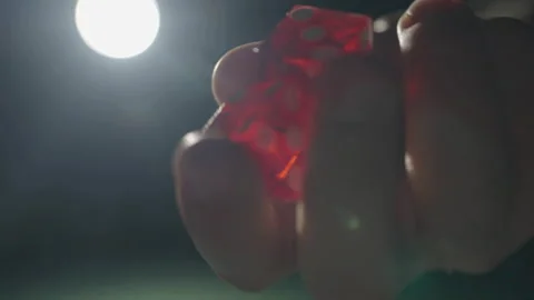 Slow motion close-up hand manipulating dices Stock Footage 335700003