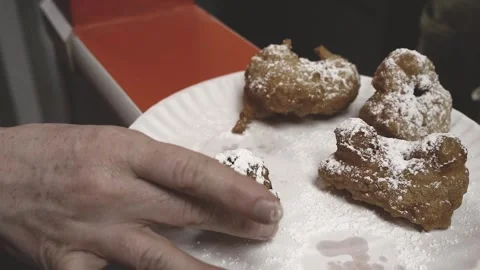 Slow Motion Close up Hand picking up Zeppole Williamsburg Brooklyn Stock Footage 252330741