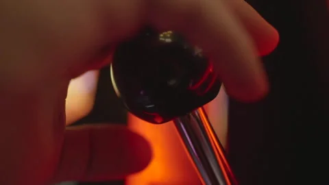 Slow motion close-up hand pulling slot lever Vídeos de archivo 334047438