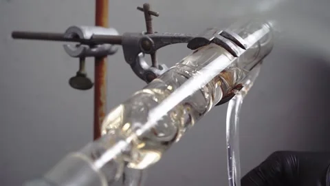 Slow motion close up of hands in black gloves  in chemistry lab Stock Footage 133254001