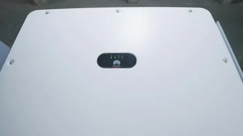 Slow motion close-up of Huawei solar inverter panel with visible cabling Stock Footage 307947833