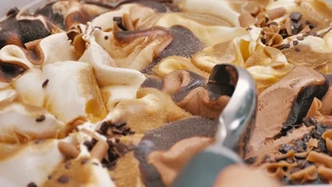 Slow motion Close up Ice cream Chocolate Chip scooped out from container with a Stock Footage 239265176