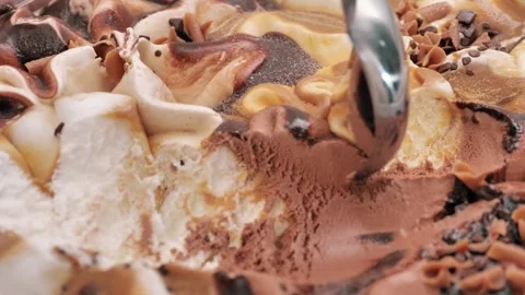 Slow motion Close up Ice cream Chocolate Chip scooped out from container with a Video stock 241525115