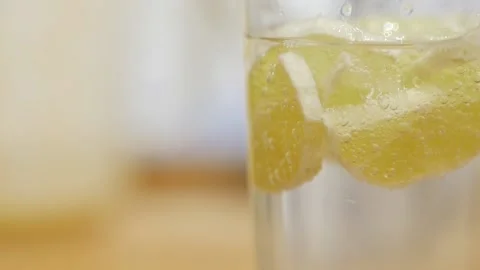 Slow motion close up lemonade mojito cocktail with soda and lemon with copy Stock Footage 143781210