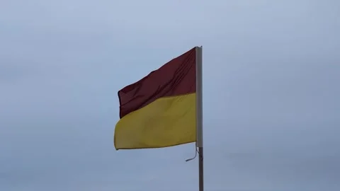 A slow motion close up of a life savers flag at the Gold Coast in Australia Video stock 305855725