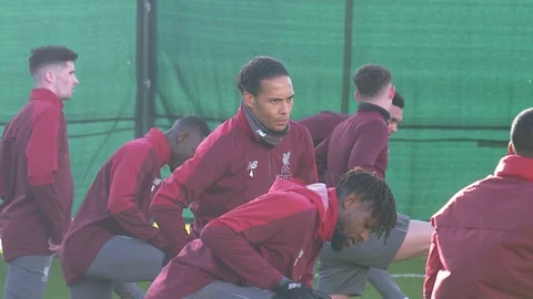 Slow motion close up of Liverpool defender Virgil van Dijk training at Melwood  Stock Footage