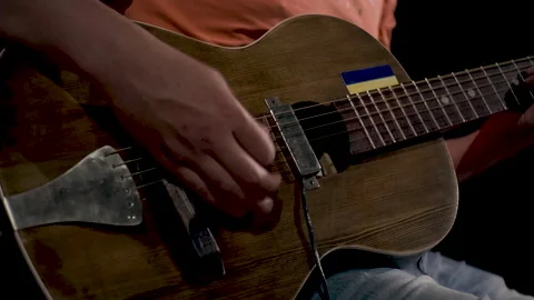 Slow motion close up, man play on acoustic guitar Stock Footage 236055362