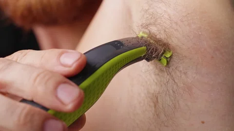 Slow Motion Close Up of a Man Shaving Armpit Hair with an Electric Body Trimmer, Stock Footage 342615651