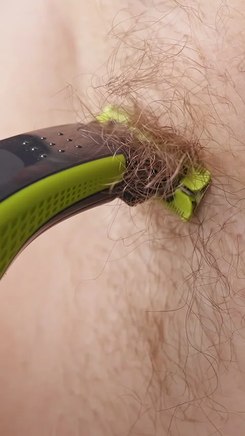 Slow Motion Close Up of a Man Shaving Armpit Hair with an Electric Body Trimmer, Stock Footage 342615801
