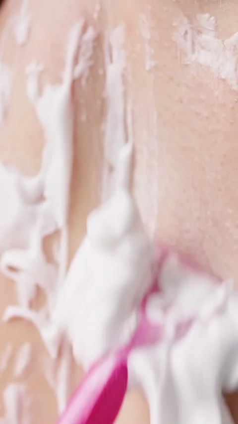 Slow Motion Close Up of a Man Shaving Armpit Hair with a Pink Razor And Shaving Stock Footage 342617385