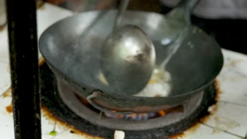 Slow Motion Close Up Man Street Vendor Cooking Egg and Fried Rice in China  Stock Footage 120529224