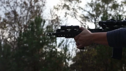 Slow Motion Close Up Of Multiple Gun Shots Fired From Assault Rifle Video stock 125540573