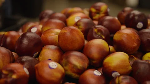 Slow Motion Close Up of Nectarines in Grocery Store Stock Footage 315726637