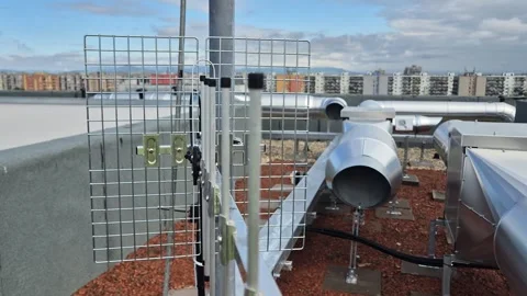 Slow Motion Close Up Pan of Rooftop Yagi Base Antenna Stock Footage 340562833