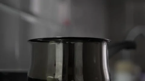 Slow motion close up of pasta falling from above in boiling water Stock Footage 339805936
