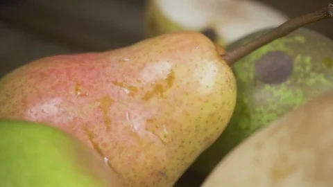 Slow motion close-up of pears and a glass of juice Stock Footage 88144301