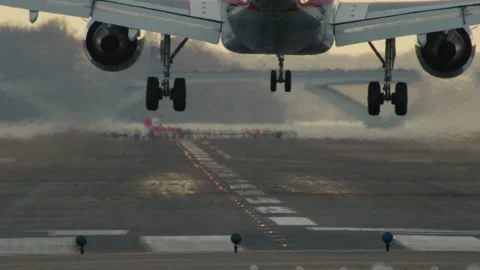 Slow Motion Close-Up Of Plane Landing On Runway Stock Footage 228314727